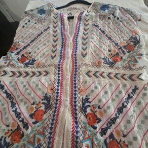 Johnny was linen top with lots of embroidery